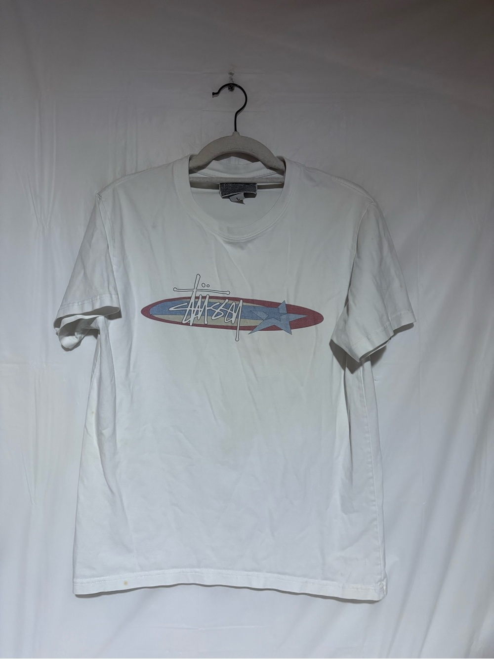 Stussy White Tee with Red Oval & Blue Star Graphic ice valley brand with stussy